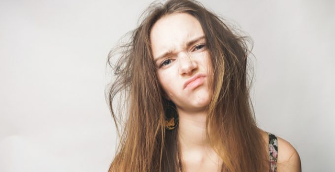 woman doubts about protein overload in hair